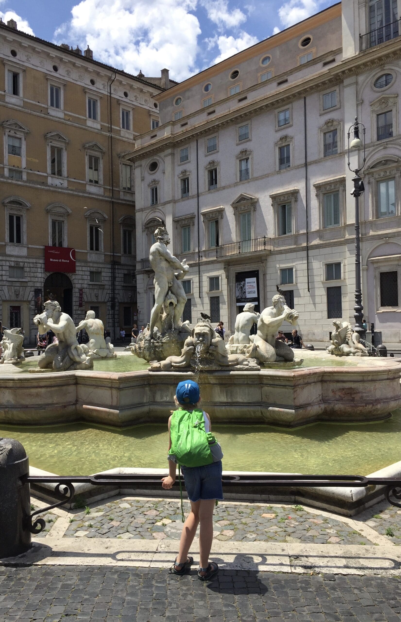 Our Daughter in Italy overlooking a fountain